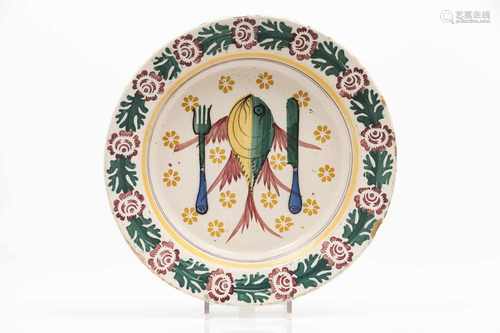 A platePortuguese faiencePolychrome decoration of cutlery and fishFloral motifs to lip