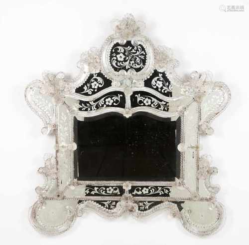 A Venetian mirrorEngraved foliage and floral decoration with applied moulded glass elementsbr