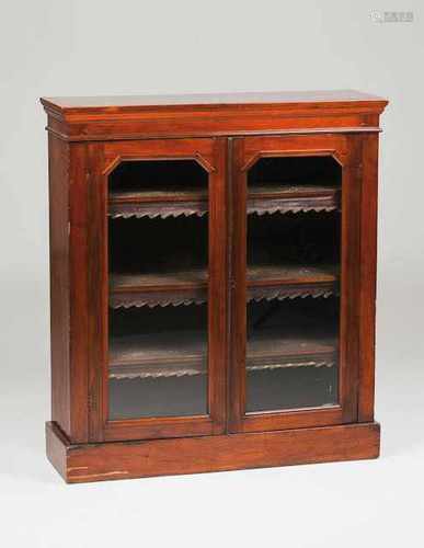 A small bookcaseMahogany veneeredTwo glazed doors and inner shelves(minor faults)10