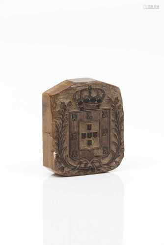 A stamp with the Kingdom of Portugal armorialCarved woodArmorial for king D.Carlos I reign