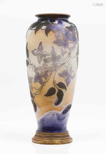 Emile Gallé (1846-1904)An Art Nouveau vaseCameo glassPurple on yellow floral decoration