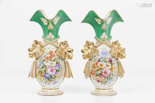 A pair of vasesFrench porcelainPolychrome and gilt decoration of floral arrangement cartouc