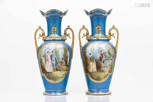 A pair of large vasesEuropean porcelainGilt on blue decoration and polychrome cartouches de