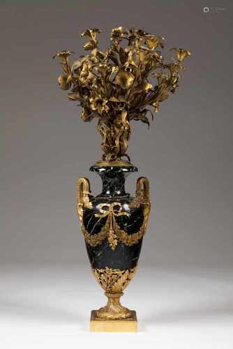 A Napoleon III style CandelabraGilt metalEight branched decorated with flowers and leavesb