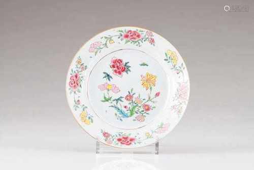 A plateChinese export porcelainPolychrome Famille Rose decoration depicting flowersYong