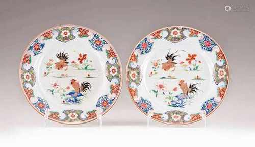 A pair of platesChinese export porcelainFamille Rose decoration depicting roosters and flow