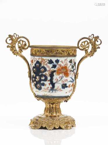 A Louis XV style urnJapanese porcelainPolychrome and gilt Imari decoration of floral and fo