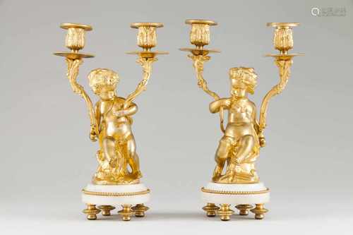 A pair of two branch candelabraGilt bronze and marblePutti shafts19th century(small