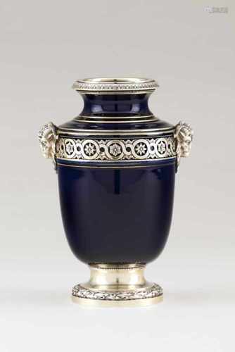 A vaseRoyal blue porcelain with silver mountsPierced and raised foliage motifs band deco