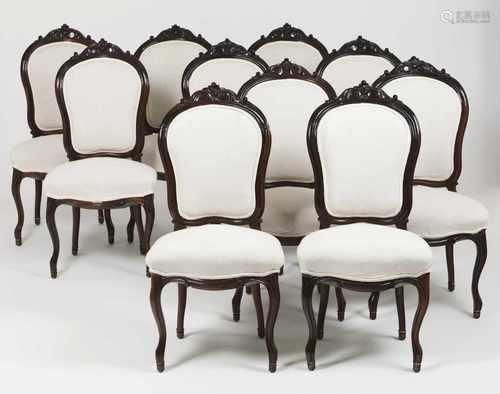 A set of ten Louis XV style chairsRosewood, foliage carved crestsYellow metal casters to fe