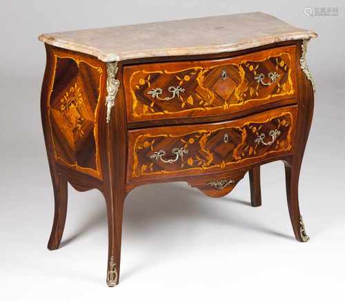 A Louis XVI style chest of drawersSolid and veneered rosewoodThorn bush marquetry work of f