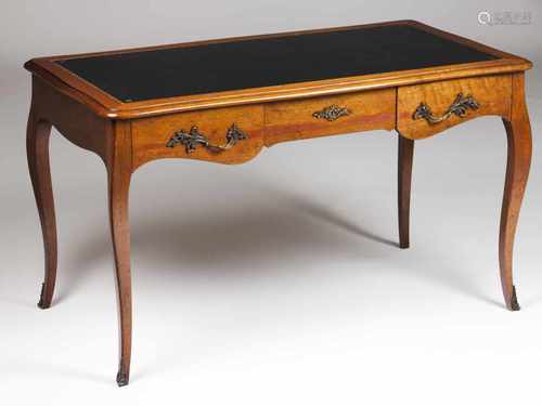 A Louis XV style writing deskWalnutLeather topThree drawers and yellow metal hardwareb