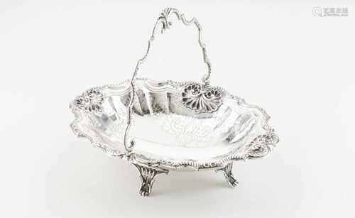 A fruit bowlPortuguese silverOval scalloped base of profuse raised and engraved decoration