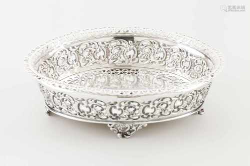 An oval fruit bowlPortuguese silverPierced base of geometric design decoration, raised and