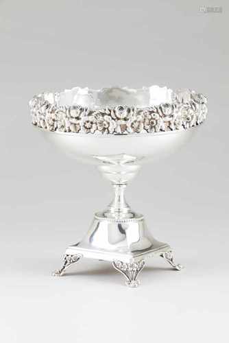 A centrepiecePortuguese silverPlain bowl and top of flower and foliage friezeOn a raise