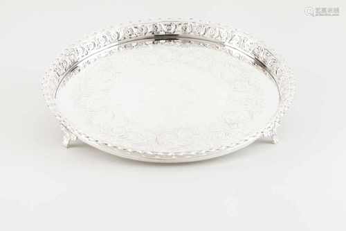 A galleried salverPortuguese silver, 19th centuryChiselled flower motifs base with pierced