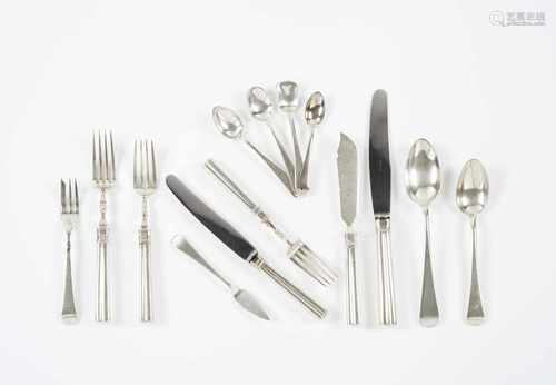 A 12 seater cutlery setPortuguese silverFluted handles12 soup spoons, 12 forks and 12 m