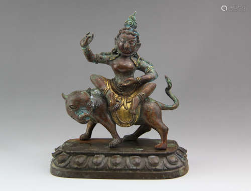 A CHINESE GILD COPPER DHAMMAPALA STATUE