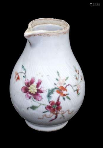 A QING DYNASTY FAMILLE ROSE MOULDED JUG mid 18th c…
