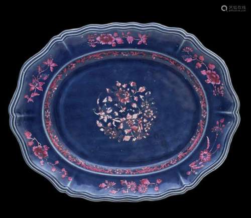 A LARGE QING DYNASTY BLUE AND RED TRAY WITH BARBED…