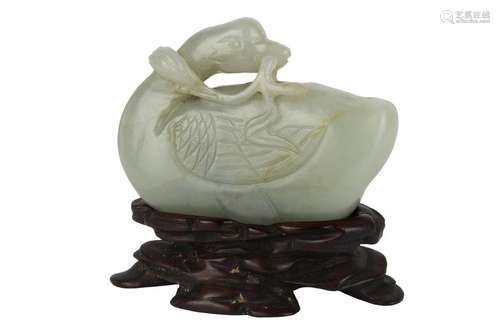 A PALE GREEN JADE CARVING OF A MANDARIN DUCK China…