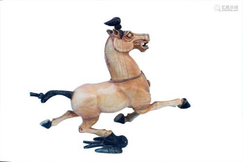 AN IVORY CARVING OF A HORSE China, early 20th cent…