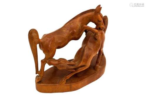 A BALINESE CARVED WOOD SCULPTURE OF TWO HORSES FIG…