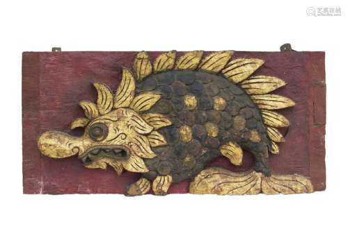 AN INDONESIAN LACQUERED AND GILT CARVED WOOD FISH …