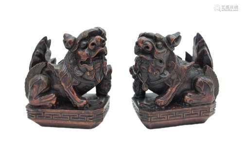 A PAIR OF CHINESE CARVED WOOD SCULPTURES OF BUDDHI…