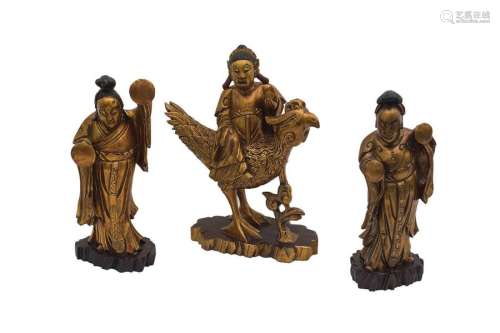 THREE SOUTH EAST ASIAN GILT AND LACQUERED CARVED W…