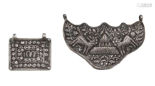 TWO INDONESIAN SILVER PENDANTS early 20th century …