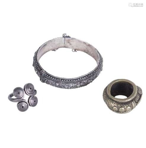 A SILVER RING, A BRONZE RING AND A SILVER BRACELET…