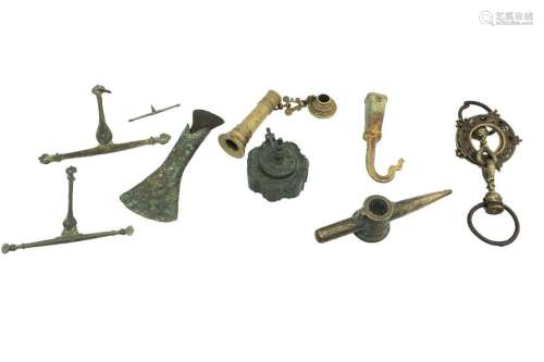 NINE INDONESIAN BRONZE AND BRASS ITEMS the larger …