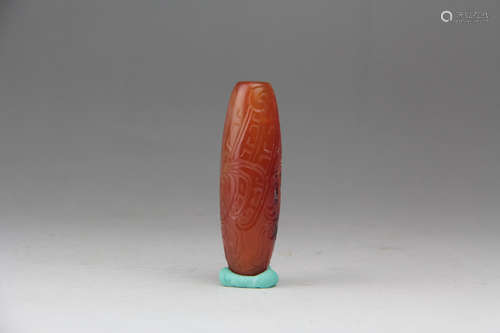 A CHINESE SOUTH RED AGATE LEZI ORNAMENT