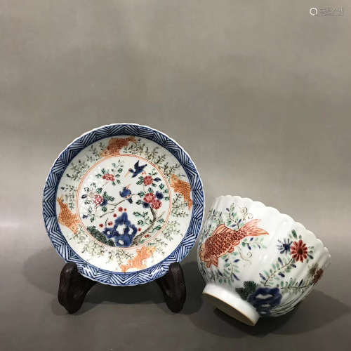 A SET OF CHINESE BLUE AND WHITE MULTI COLORED PORCELAIN CUP AND SAUCER