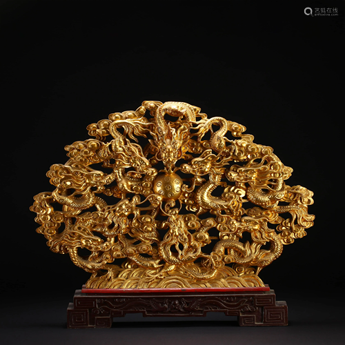 A CHINESE GILDING NINE DRAGONS CARVED…