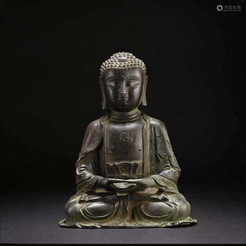 A CHINESE COPPER STATUE OF SAKYAMUNI