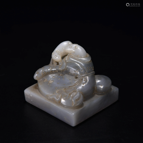 A CHINESE CARVED JADE SEAL