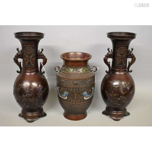 A pair of Japanese bronze twin handled vases,