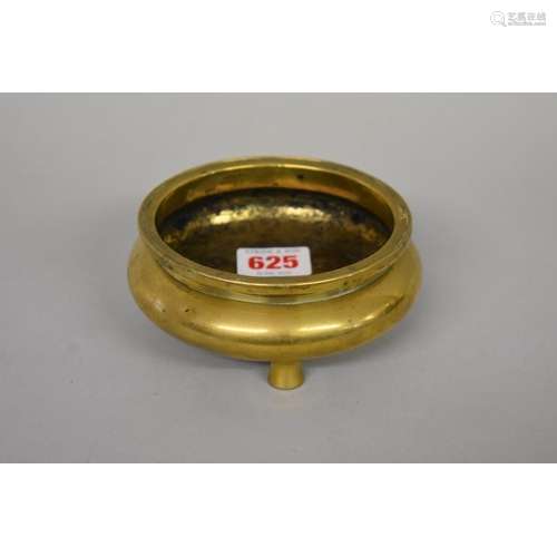 A Chinese polished bronze tripod censer,