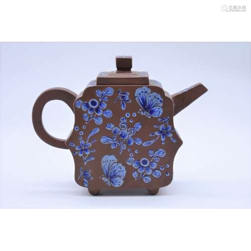 A Chinese yixing teapot and cover,