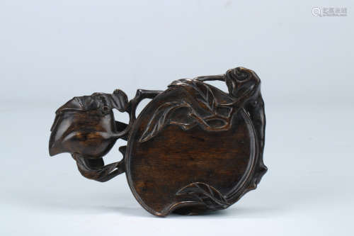 A Chinese Eaglewood Peach Shaped Inkstone