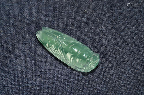 A Chinese Carved Jadeite Pendant