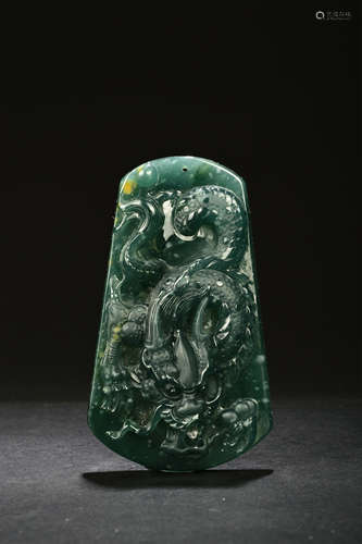 A Chinese Dragon Carved Jadeite Pendant