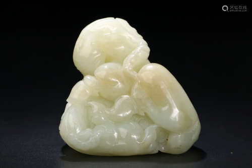 A Chinese Carved Hetian Jade Sheep Ornament