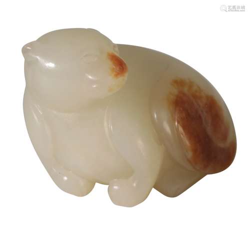 SMALL CELADON AND RUSSET CARVED JADE FIGURE OF A BEAR