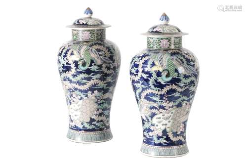 IMPRESSIVE PAIR OF FAMILLE ROSE 'PHOENIX' JARS AND COVERS, QING DYNASTY, 19TH CENTURY