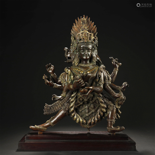 A GILT BRONZE FIGUER OF BUDDHIST DEITY