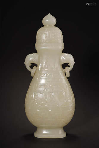 A NICE CARVED WHITE JADE VASE W/CO…