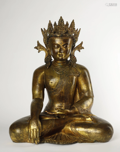 A GILT BRONZE SEATED BUDDHA STATUE